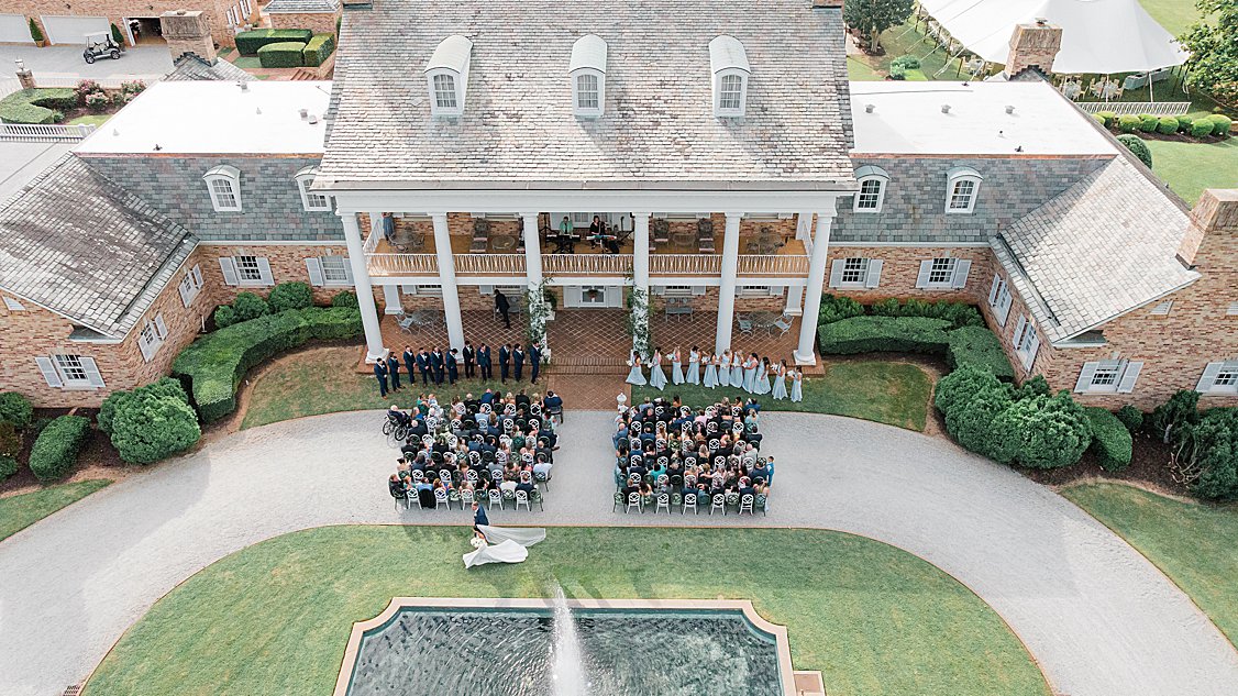 Drone photos of bride and groom living the ceremony