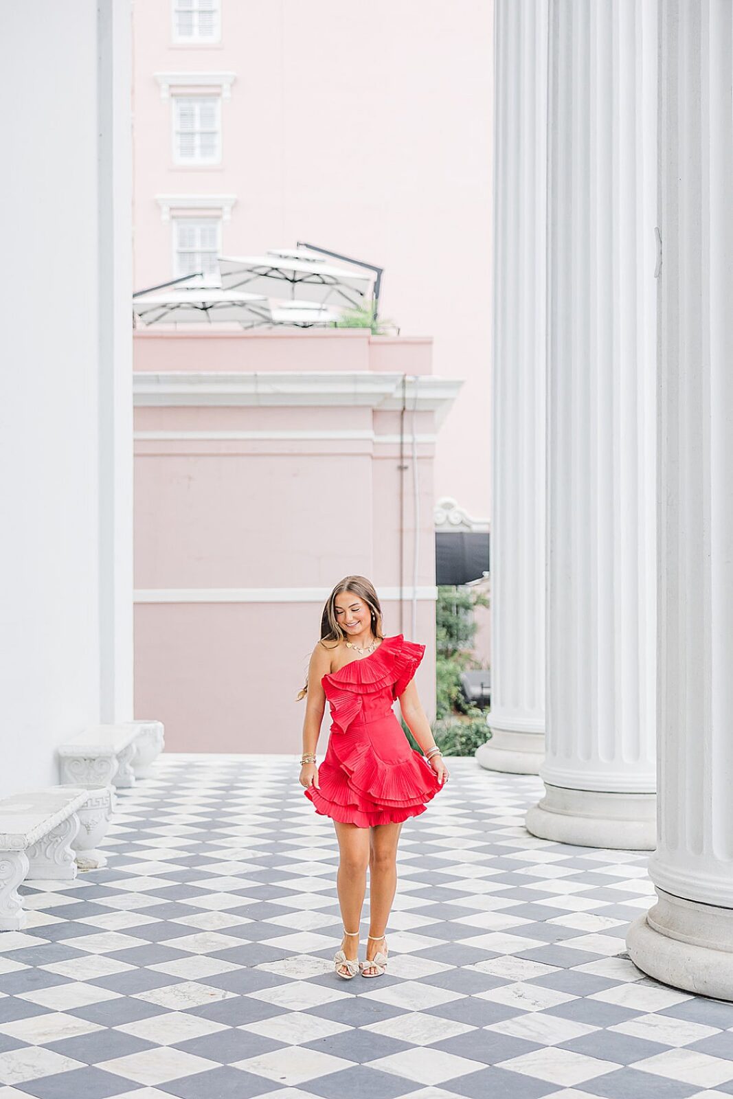 Lauren posing in stylish outfit at outside the Mills House in downtown Charleston, South Carolina.