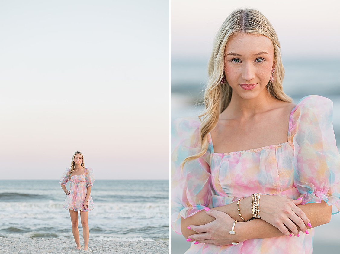 Senior portrait of Brooke at Isle of Palms beach with a vibrant cotton candy sunset, creating a dreamy coastal backdrop.