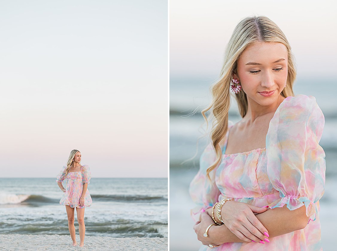Senior portrait of Brooke at Isle of Palms beach with a vibrant cotton candy sunset, creating a dreamy coastal backdrop.