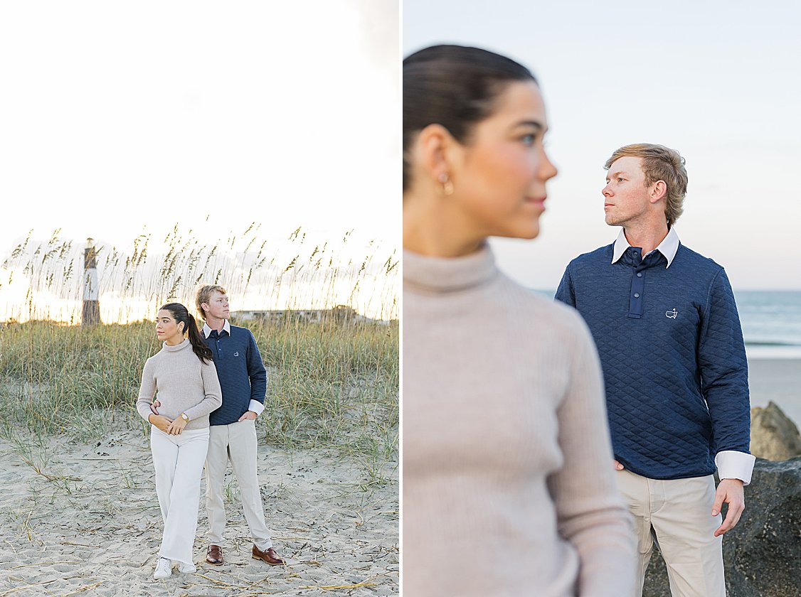 Couple walking hand in hand along Tybee Island beach at sunset, dressed in soft coastal chic attire.