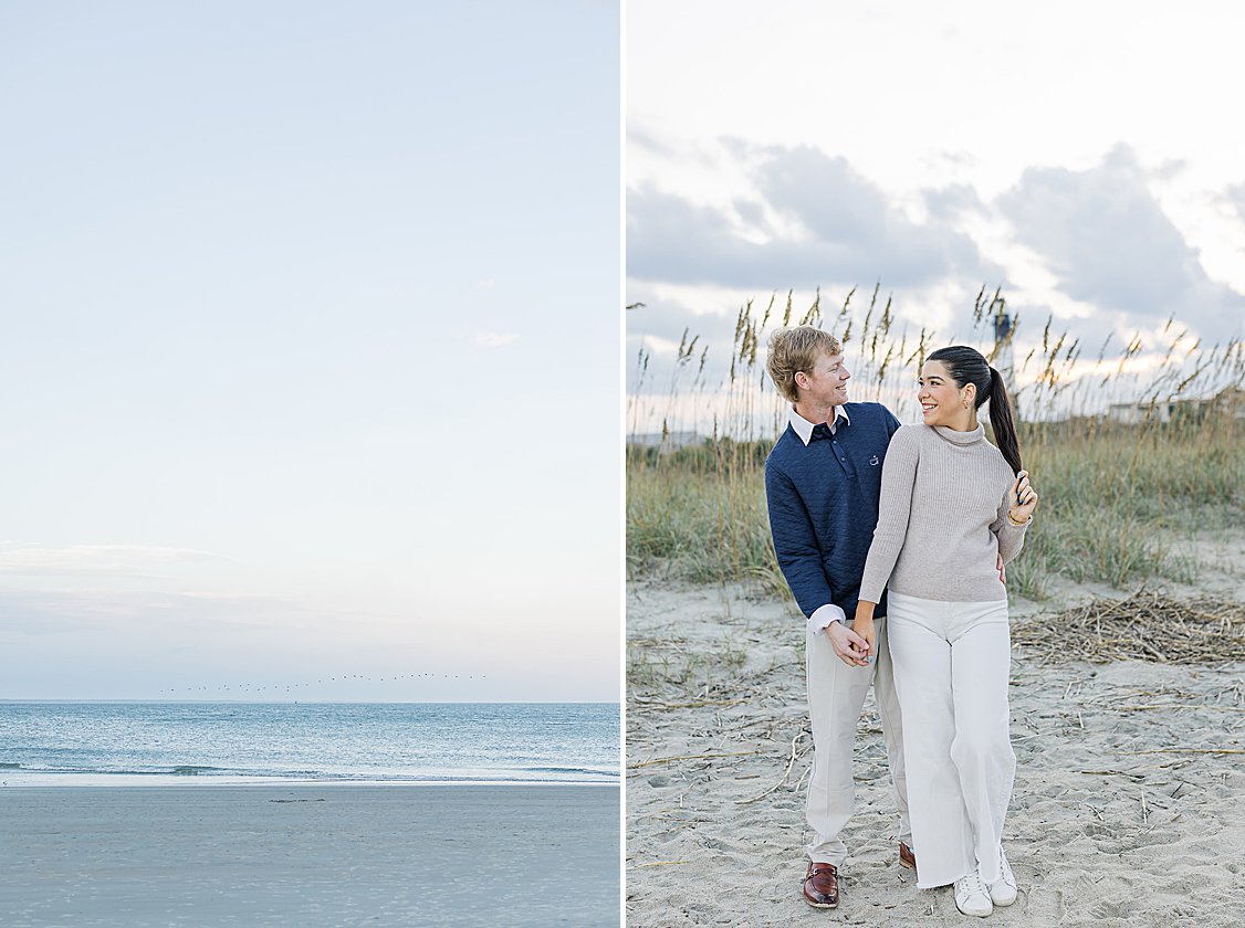 Couple walking hand in hand along Tybee Island beach at sunset, dressed in soft coastal chic attire.