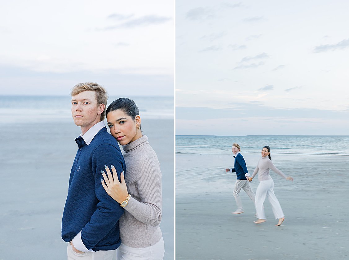 Couple walking hand in hand along Tybee Island beach at sunset, dressed in soft coastal chic attire.