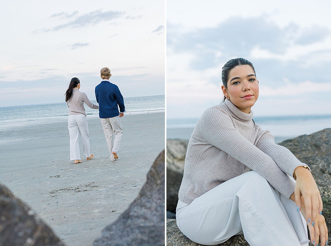 Couple walking hand in hand along Tybee Island beach at sunset, dressed in soft coastal chic attire.